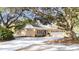 Ranch home with attached garage and mature landscaping at 272 Old Ashley Loop, Pawleys Island, SC 29585