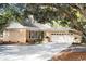 Charming ranch home with a large garage, and mature trees at 272 Old Ashley Loop, Pawleys Island, SC 29585