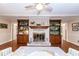 Living room features a whitewashed brick fireplace and built-in shelving at 272 Old Ashley Loop, Pawleys Island, SC 29585