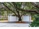 Detached two-car garage with roll-up doors at 272 Old Ashley Loop, Pawleys Island, SC 29585