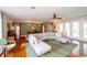 Spacious living area with L-shaped sofa and hardwood floors at 272 Old Ashley Loop, Pawleys Island, SC 29585