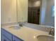 Bathroom features double sinks with quartz countertops and large mirrors at 301 Palmetto Sand Loop, Conway, SC 29527