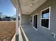 Spacious covered patio with ceiling fans and a view of the backyard at 301 Palmetto Sand Loop, Conway, SC 29527