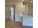 Modern interior view showcasing the open floor plan and seamless flow between rooms at 301 Palmetto Sand Loop, Conway, SC 29527