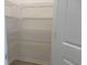 Walk-in pantry has metal shelving and ample storage space at 301 Palmetto Sand Loop, Conway, SC 29527