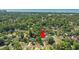 Aerial view of a home near the shore, surrounded by lush greenery, offering both privacy and coastal access at 4502 Boxwood St., Myrtle Beach, SC 29577