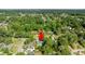Aerial view of a home surrounded by trees, in a neighborhood with easy access to local amenities and green spaces at 4502 Boxwood St., Myrtle Beach, SC 29577