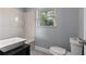 This bathroom features a stylish vanity sink, a toilet, and a shower-tub combo at 4502 Boxwood St., Myrtle Beach, SC 29577