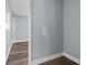 Bedroom has wood-look floors, neutral paint, and a view to another room, enhancing the space at 4502 Boxwood St., Myrtle Beach, SC 29577
