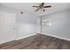 Bedroom features wood-look flooring, neutral paint, ceiling fan, and natural light from the window at 4502 Boxwood St., Myrtle Beach, SC 29577