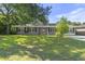 Charming single-story home featuring a manicured front lawn, well-placed shrubs and a classic facade at 4502 Boxwood St., Myrtle Beach, SC 29577