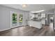 Modern kitchen with white cabinets, granite countertops, and stainless steel appliances at 4502 Boxwood St., Myrtle Beach, SC 29577