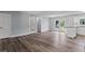 Light-filled living room with hardwood floors and French doors to the backyard at 4502 Boxwood St., Myrtle Beach, SC 29577