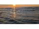 Calm ocean view at sunset, featuring gently rolling waves and a golden sky reflection at 4502 Boxwood St., Myrtle Beach, SC 29577