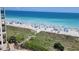 Beachside scene of a sandy beach with people enjoying the sun and ocean views at 4719 S Ocean Blvd. # 609, North Myrtle Beach, SC 29582