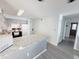 The bright kitchen offers modern appliances, granite counters, and opens to the living area at 4719 S Ocean Blvd. # 609, North Myrtle Beach, SC 29582