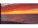 Scenic sunset at the beach with orange and yellow skies at 4719 S Ocean Blvd. # 609, North Myrtle Beach, SC 29582