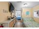 Small bedroom with twin bed and ocean-themed bedding at 6001 - D07 S Kings Hwy., Myrtle Beach, SC 29575