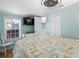 Spacious bedroom with a comfortable bed and adjacent bathroom at 6001 - D07 S Kings Hwy., Myrtle Beach, SC 29575