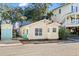 Charming yellow cottage with deck, storage shed, and colorful patio furniture at 6001 - D07 S Kings Hwy., Myrtle Beach, SC 29575
