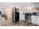 Modern kitchen with stainless steel appliances and white cabinets at 6001 - D07 S Kings Hwy., Myrtle Beach, SC 29575