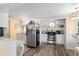 Modern kitchen with stainless steel appliances and white cabinets at 6001 - D07 S Kings Hwy., Myrtle Beach, SC 29575