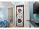 Convenient laundry closet with stackable washer and dryer at 6001 - D07 S Kings Hwy., Myrtle Beach, SC 29575