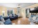 Spacious living room with comfortable seating and access to the kitchen at 6001 - D07 S Kings Hwy., Myrtle Beach, SC 29575