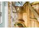 Enclosed outdoor shower with wooden walls and bench at 6001 - D07 S Kings Hwy., Myrtle Beach, SC 29575