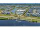 Stunning aerial view of the community amenities including a pond, pool, and walking path at 6550 Anterselva Dr., Myrtle Beach, SC 29572