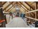 Unfinished attic with exposed wooden beams and plenty of storage space at 6550 Anterselva Dr., Myrtle Beach, SC 29572