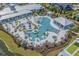 Overhead view of luxurious outdoor community pool with lounging areas and various covered seating at 6550 Anterselva Dr., Myrtle Beach, SC 29572