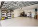 Spacious garage with ample storage and a golf cart at 6550 Anterselva Dr., Myrtle Beach, SC 29572