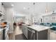 Spacious kitchen island with granite countertops and stainless steel appliances, perfect for entertaining at 6550 Anterselva Dr., Myrtle Beach, SC 29572