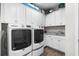 Laundry room featuring modern appliances and ample storage at 6550 Anterselva Dr., Myrtle Beach, SC 29572