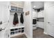 Mudroom with coat rack, bench with shoe storage, and laundry room at 6550 Anterselva Dr., Myrtle Beach, SC 29572