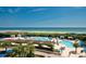 Resort featuring multiple outdoor pools, lounge areas, and ocean views, ideal for a sunny getaway at 6550 Anterselva Dr., Myrtle Beach, SC 29572