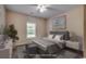 Virtually staged bedroom with gray bedding and modern decor at 100 Barons Bluff Dr., Conway, SC 29526