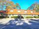 Brick townhouse with brown shingle roof and landscaping at 1025 Carolina Rd. # Cc1, Conway, SC 29526