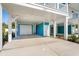 Spacious carport with parking and a garage and white support beams at 2302 Seaseeker Ln., Myrtle Beach, SC 29577
