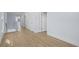 Bright hallway features beautiful wood-look flooring and white trim at 2302 Seaseeker Ln., Myrtle Beach, SC 29577