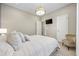 Main bedroom with a queen bed and walk in closet at 301 Climbing Vine Ct., Conway, SC 29526