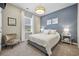 Bedroom with a queen bed, nightstands, and a comfortable chair at 301 Climbing Vine Ct., Conway, SC 29526