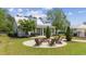 Community fire pit area with seating, perfect for outdoor gatherings at 301 Climbing Vine Ct., Conway, SC 29526