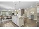 Open concept kitchen with island and hardwood floors at 301 Climbing Vine Ct., Conway, SC 29526