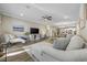 Open living area with hardwood floors and cozy seating at 301 Climbing Vine Ct., Conway, SC 29526
