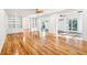 Bright and airy living room with hardwood floors, custom built-ins, and ample natural light at 356 Rossdhu Ave., Pawleys Island, SC 29585