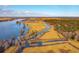 Beautiful river view with natural landscaping and boat docks at 356 Rossdhu Ave., Pawleys Island, SC 29585