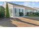 The home's backyard has a covered patio and green space that's ideal for outdoor enjoyment at 4463 Livorn Loop # 4463, Myrtle Beach, SC 29579