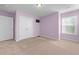 Bedroom featuring plush carpet flooring, and a closet with double doors and natural light at 4463 Livorn Loop # 4463, Myrtle Beach, SC 29579